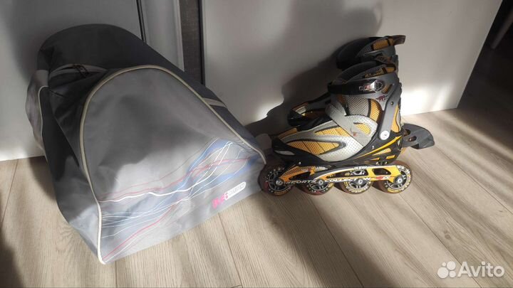 Роликовые коньки