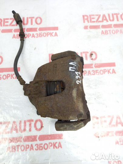 Суппорт тормозной передний левый Mazda Mazda3 BK