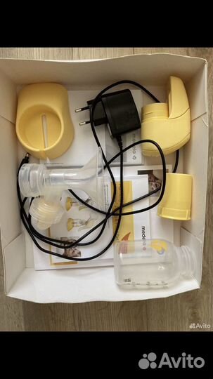 Молокоотсос medela электрический