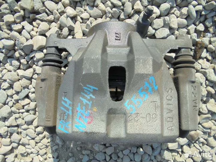 Суппорт передний левый Toyota Corolla Fielder