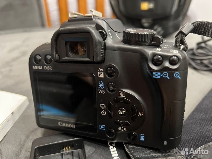 Зеркальный фотоаппарат canon eos1000d 18-55 мм