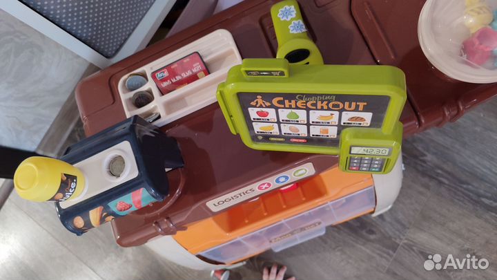 Касса и кукольный домик