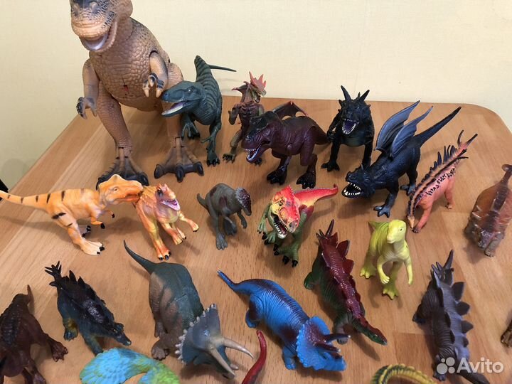 Игрушки динозавры и драконы