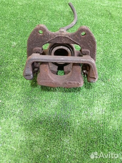 Суппорт задний левый бмв е90