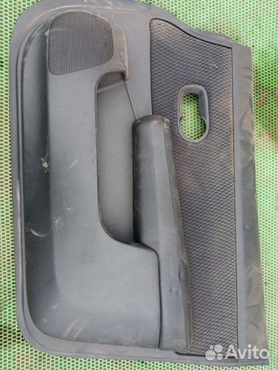 Обшивка карта двери передняя правая Nissan Tiida