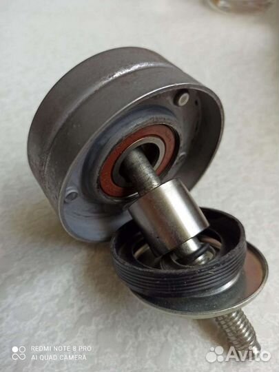 Ролик натяжителя