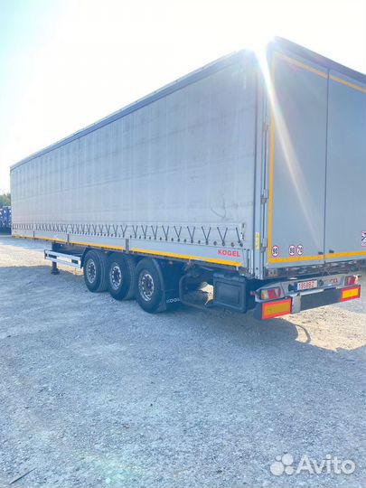 Полуприцеп шторный Kogel Cargo с усиленным шасси, 2014