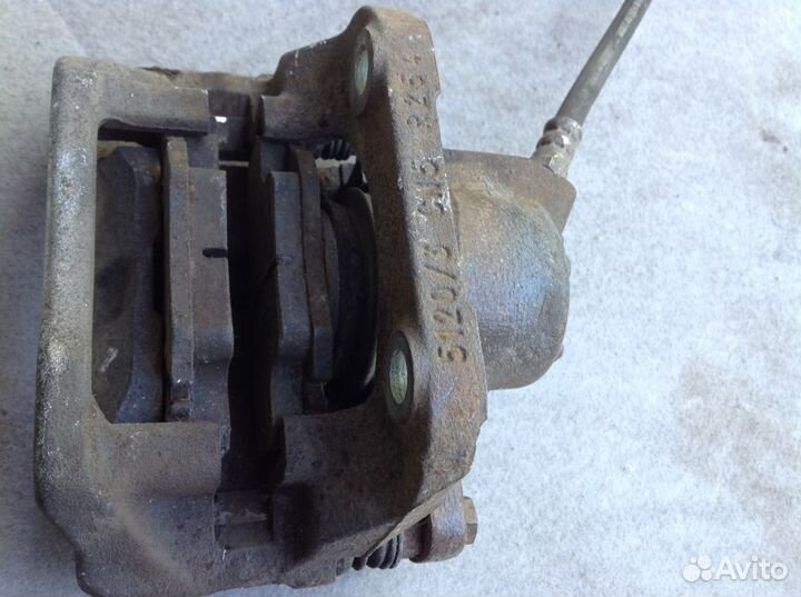 Суппорт тормозной передний левый Рено