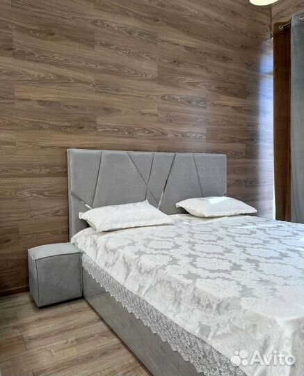 Кровать с подъемным механизмом