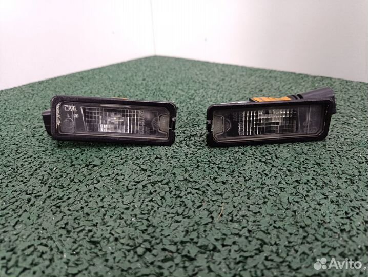 Фонарь подсветки номера VW Passat B7