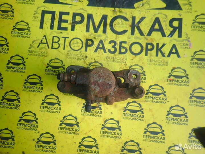 Суппорт задний левый Mitsubishi Lancer 9