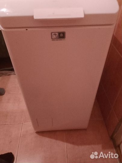 Стиральная машина с вертикальной загрузкой