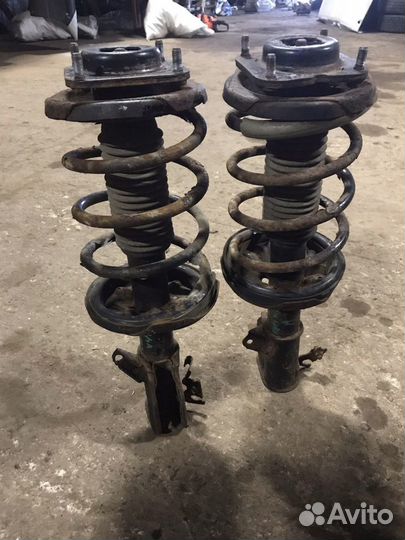 Стойки передние Мазда Примаси