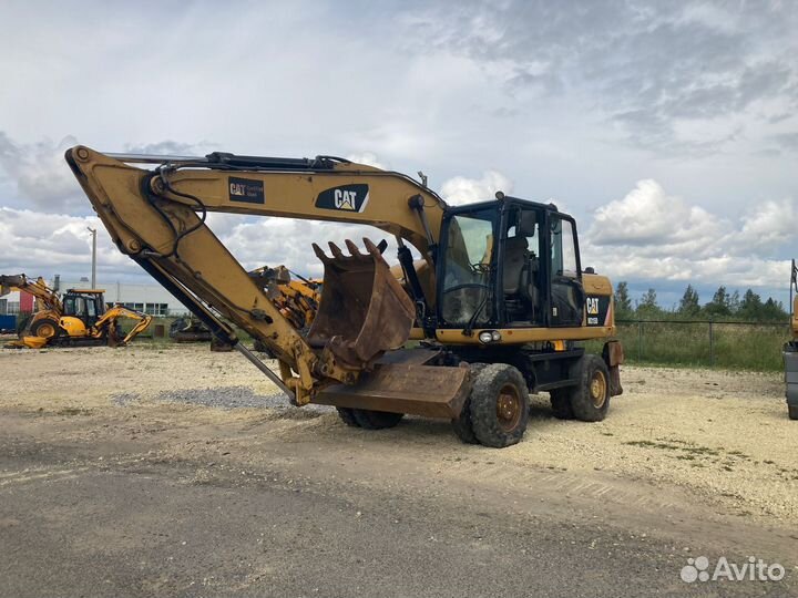 Колёсный экскаватор CAT M315D, 2010