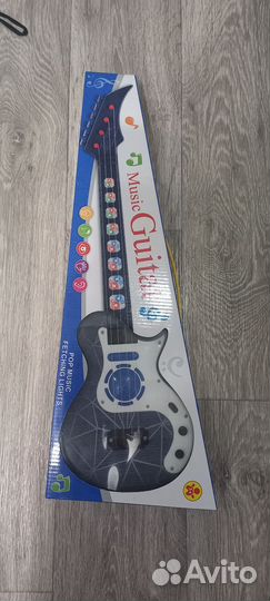 Музыкальная детская гитара
