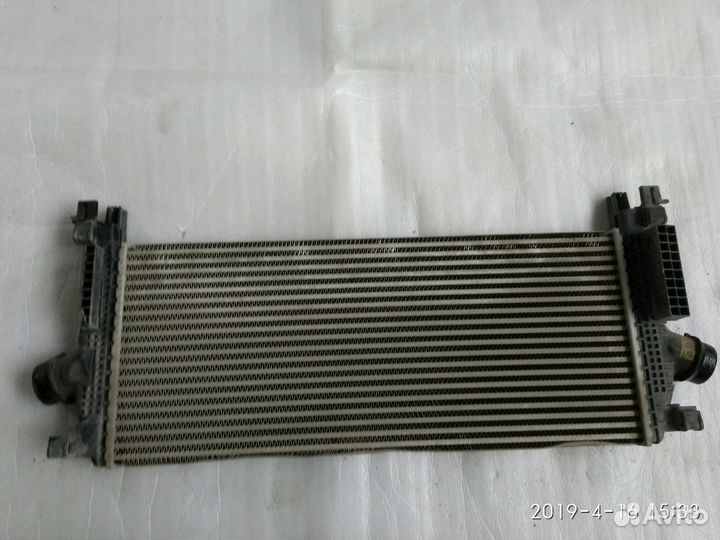 Opel Astra J радиатор интеркуллер