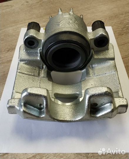 Суппорт тормозной передний левый peugeot 3008 2010