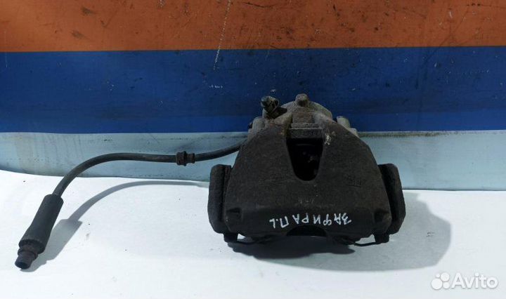 Суппорт тормозной передний правый Opel Zafira B