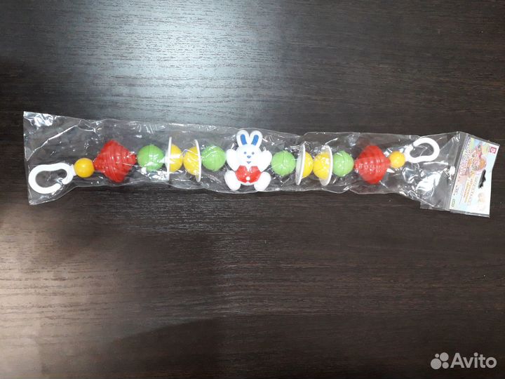 Погремушка-растяжка на коляску/кроватку