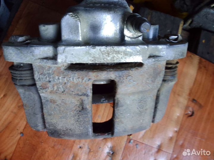 Суппорт ваз 2110