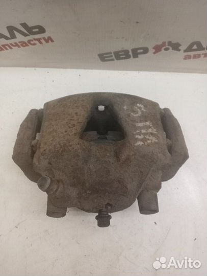 Суппорт тормозной передний левый Opel Vectra B