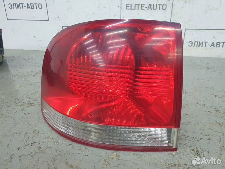 Фонарь левый внешний Volkswagen Touareg