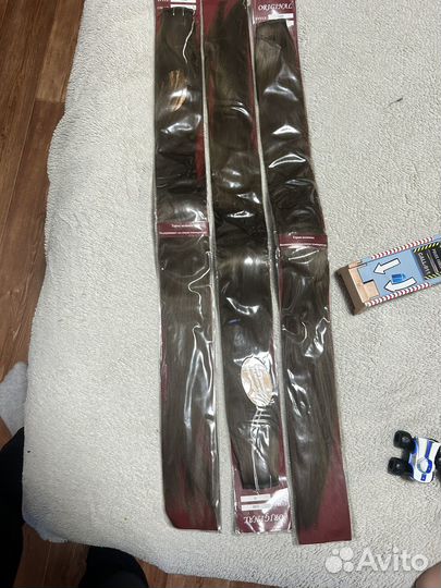 Накладные волосы на заколках