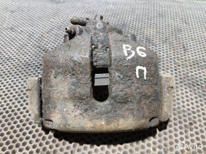 Суппорт передний передний правый Volkswagen Passat