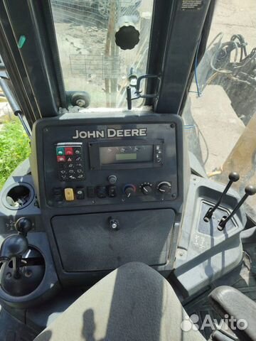 Экскаватор-погрузчик John Deere 325K, 2012 объявление продам