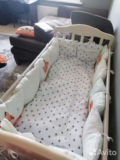 Детская кроватка с продольным маятником