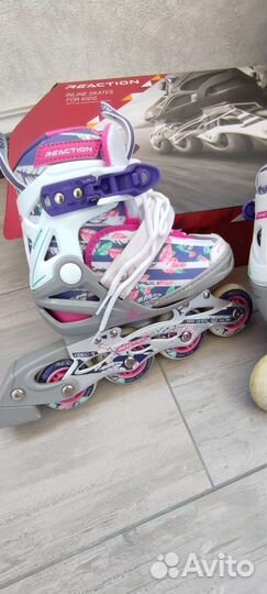 Роликовые коньки