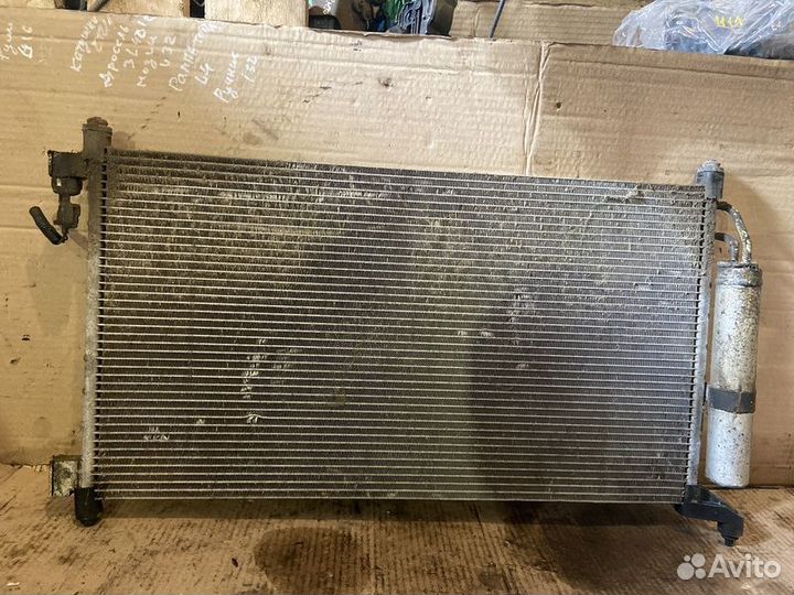 Радиатор кондиционера Nissan Tiida