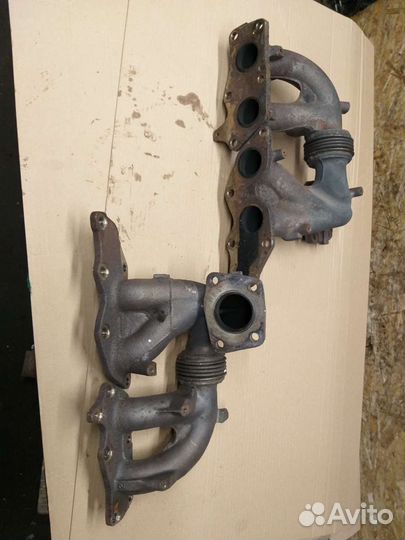 Коллектор выпускной 2.3 турбо Мазда сх7 оригинал