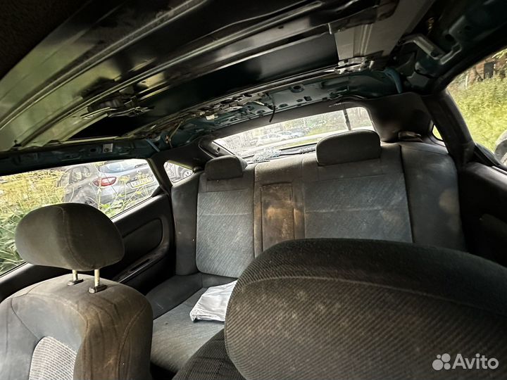 Mazda 323, 1998