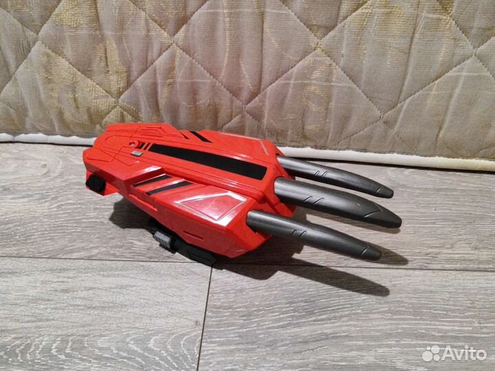 Детская игрушка коготь