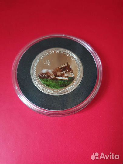 Монета серебряная 
