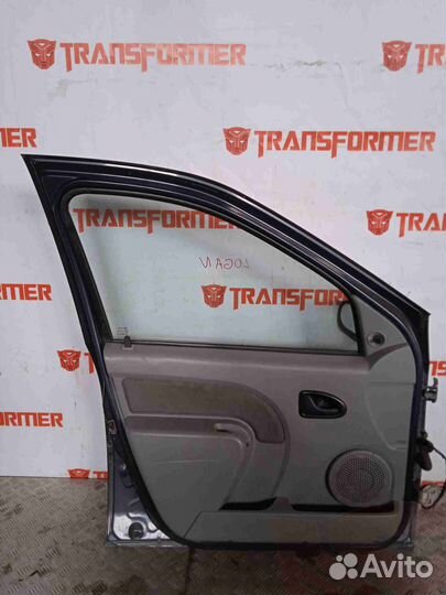 Стекло двери переднее левое Рено Логан 1