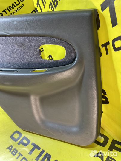 Обшивка задней левой двери Kia Spectra