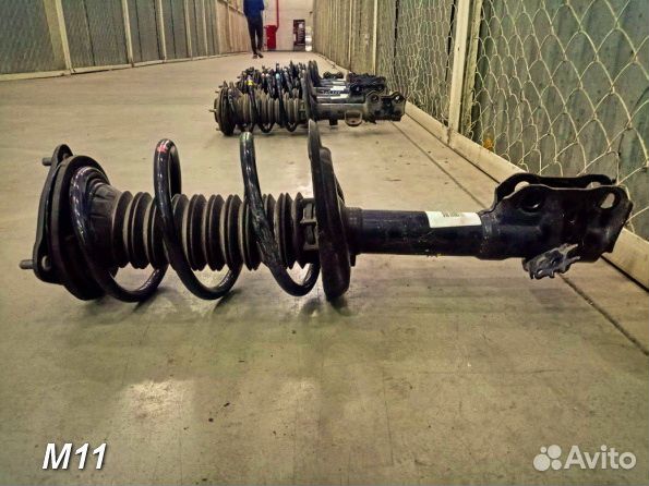 Стойка амортизатора Передняя Toyota RAV-4 XA50