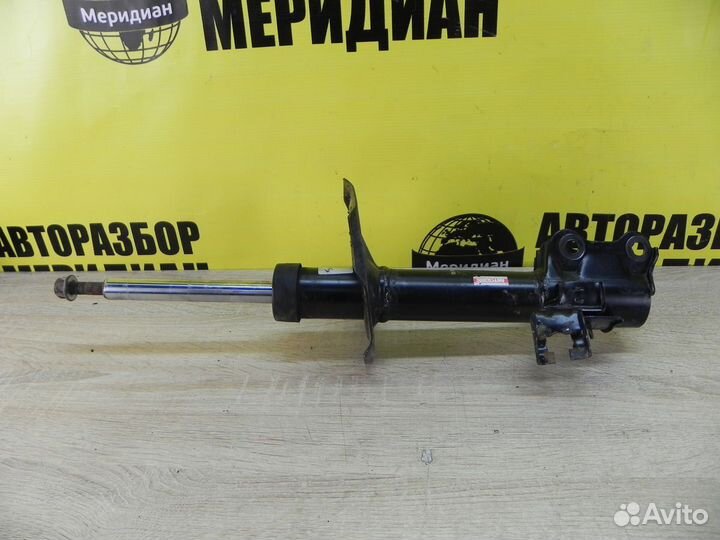 Nissan Almera N16 Амортизатор передний