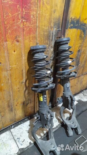 Стойка амортизатора передняя Опель астра J GTC