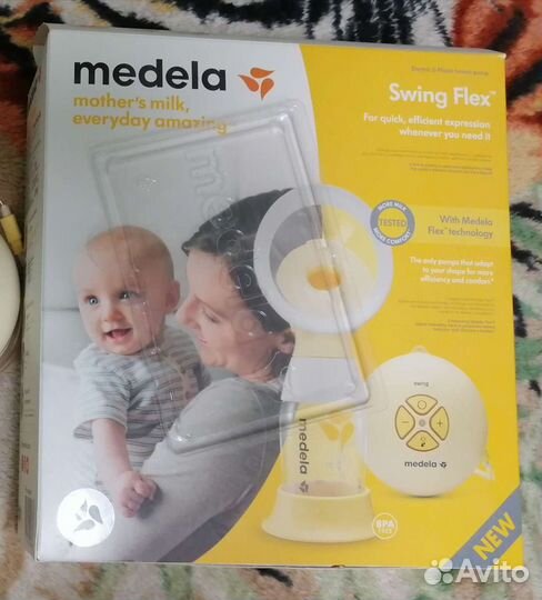 Молокоотсос medela электрический