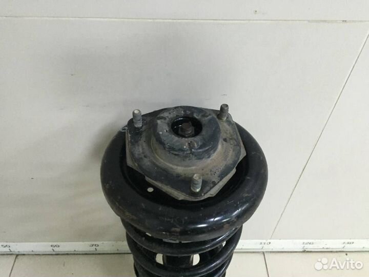 Амортизатор передний правый Nissan Primera P12 2002-2007