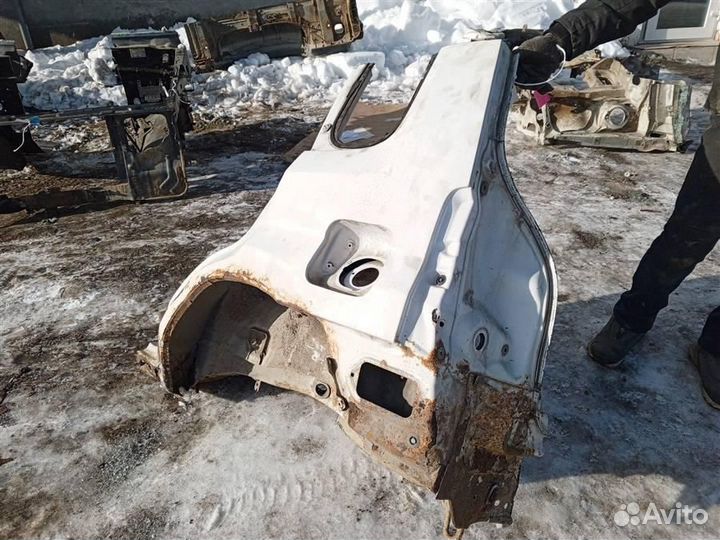 Крыло заднее левое Mazda Demio