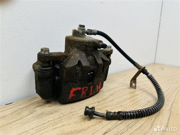 Суппорт тормозной передний левый Kia Cerato 3 2.0