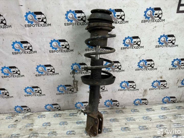 Амортизатор передний левый Opel Vectra B универсал