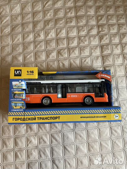 Игрушка автобус электронный