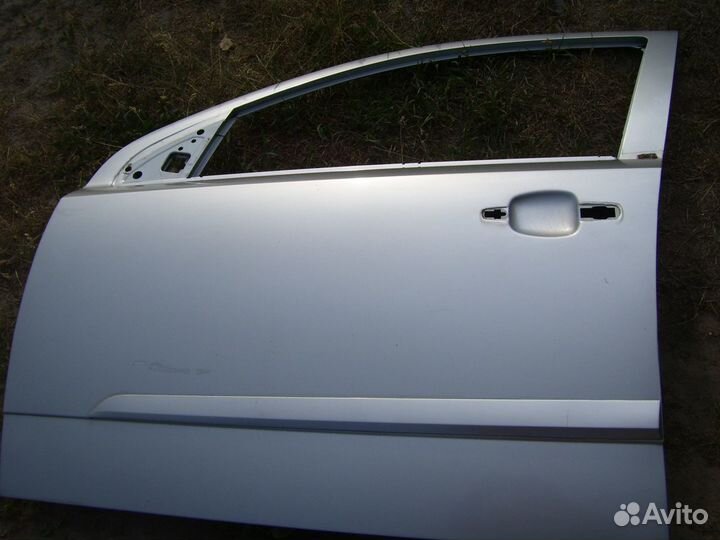 Опель астра H дверь