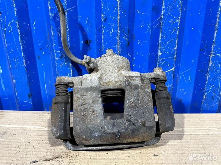 Суппорт передний правый Daewoo Nexia N100 1.5