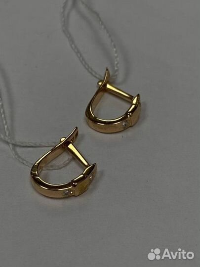 Золотые серьги с камнем